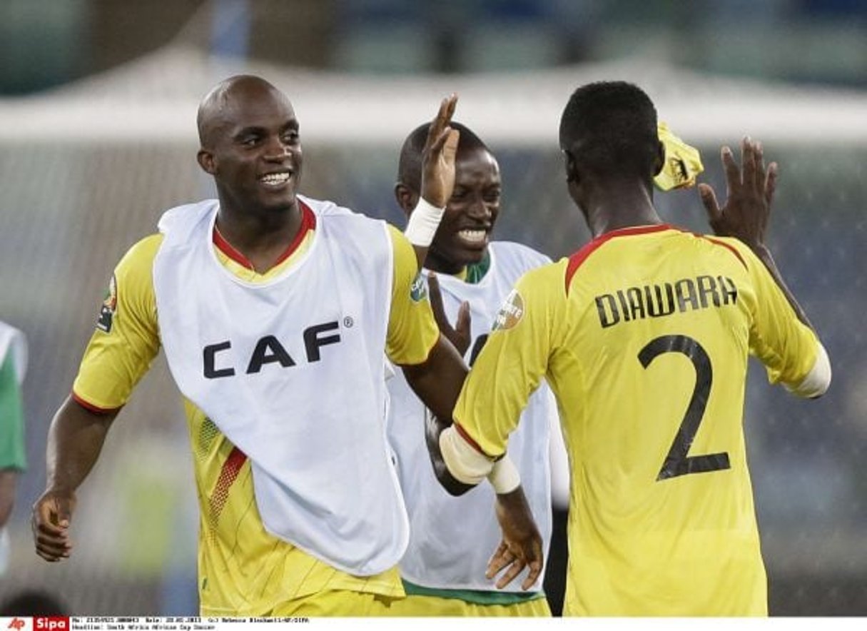 Les joueurs maliens Mohamed Sissoko, Ousmane Coulibaly et Fousseyni Diawara (au centre), lors de la CAN, en janvier 2013. © AP Photo/Rebecca Blackwelll