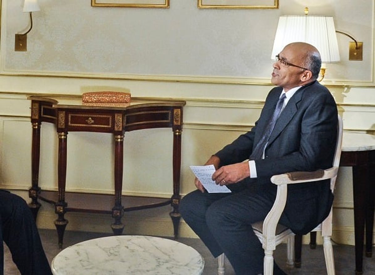 Jean-Karim Fall, lors d’une interview avec un chef d’Etat africain, en avril 2013, à Paris. © Vincent Fournier/JA