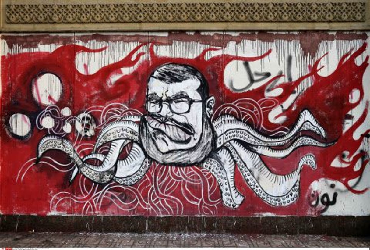 Graffiti représentant Mohamed Morsi, au Caire. © Hassan Ammar/AP/SIPA