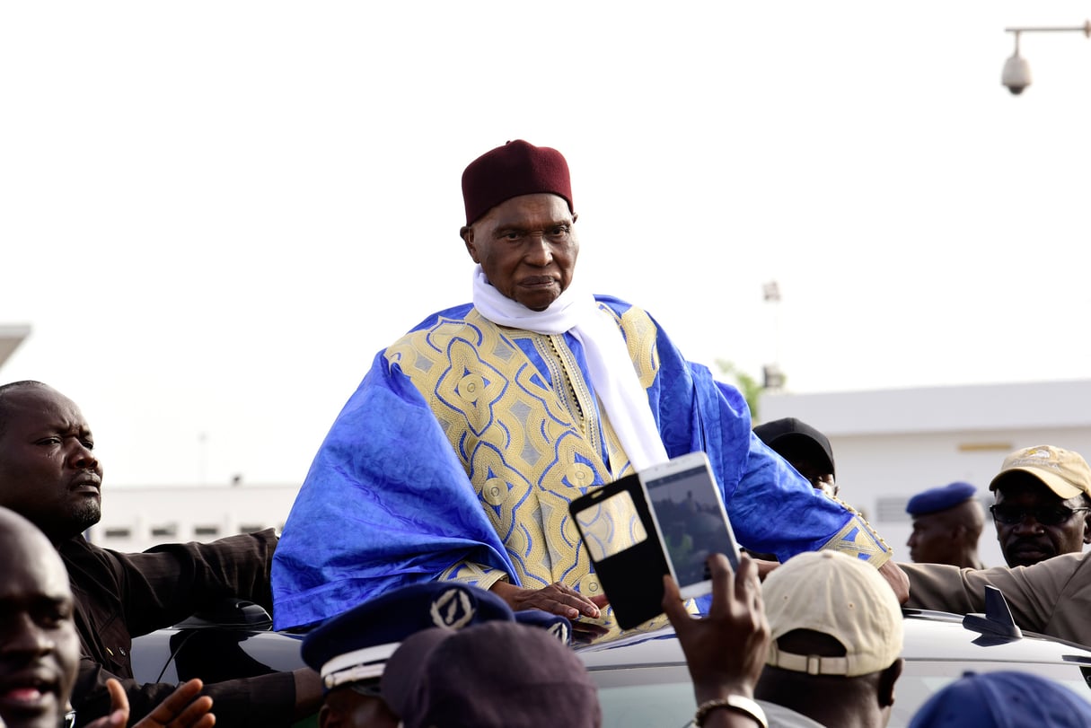L’ex-président Abdoulaye Wade, tête de liste de la Coalition gagnante Wattu Senegaal, lors de son retour à Dakar, le 10 juillet, dix jours avant les législatives. &copy; Seyllou/AFP