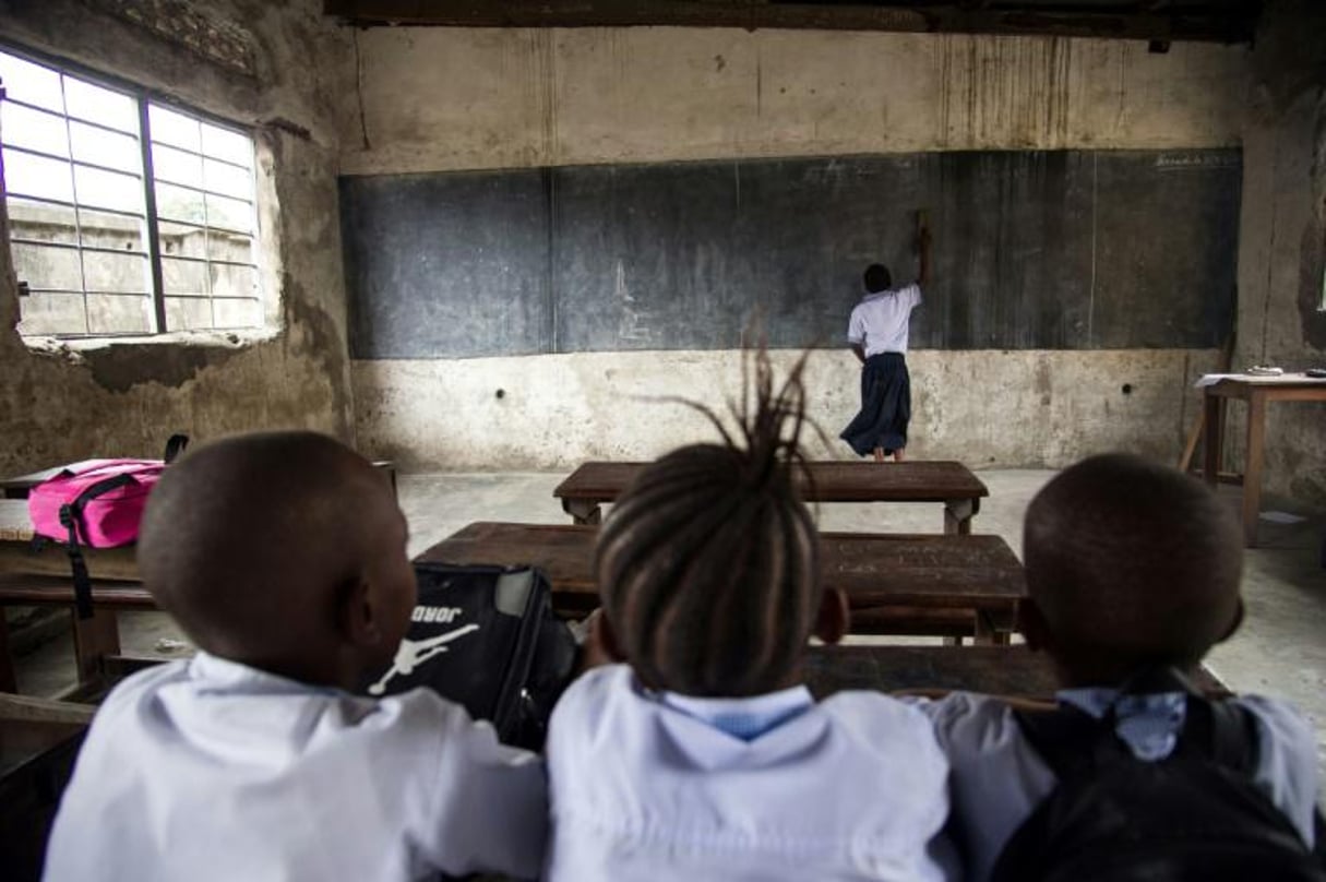 Des écoliers dans une salle de classe à Kinshasa, le 7 septembre 2016, en RDC. © Junior Kannah/AFP