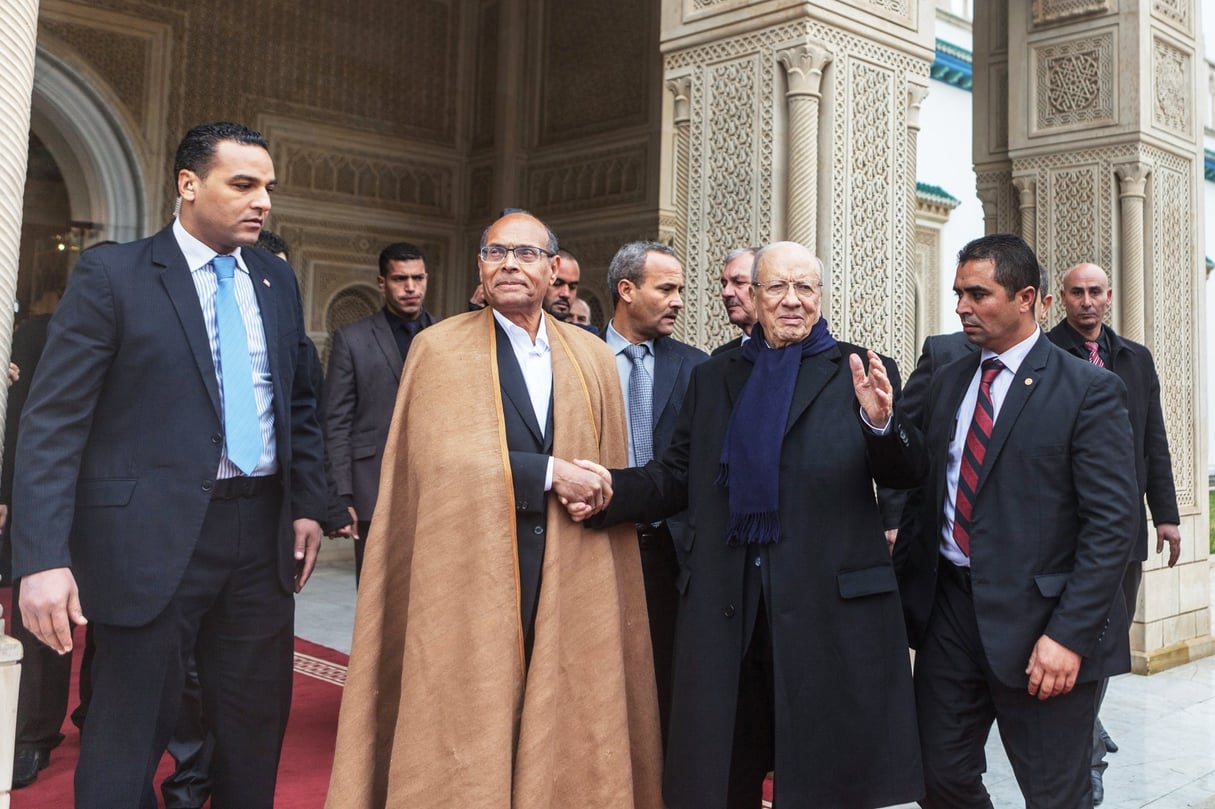 Passage de témoin avec Béji Caïd Essebsi, le 31 décembre 2014, au palais de Carthage. &copy; amine landoulsi/Anadolu Agency/AFP