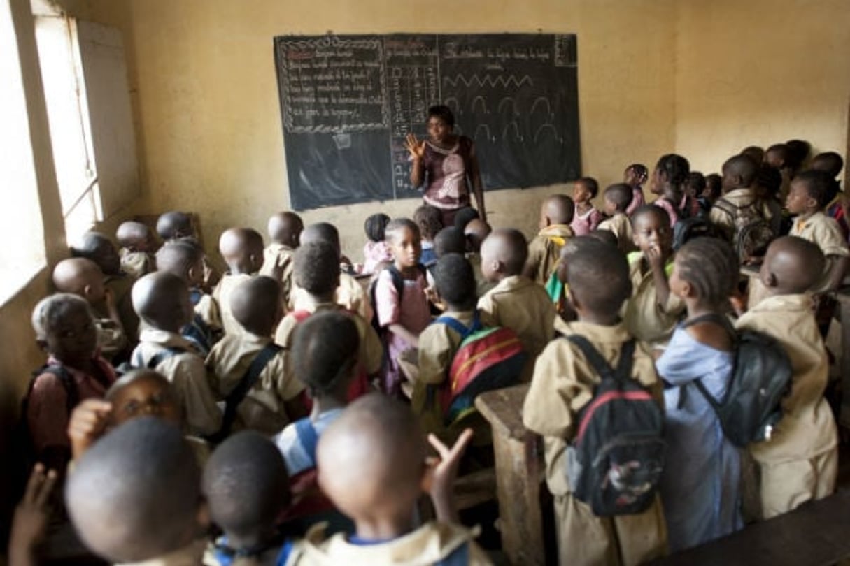 Dans une salle de classe du quartier de Hafia, à Conakry, en 2012 (archives). © Sylvain Cherkaoui pour Jeune Afrique