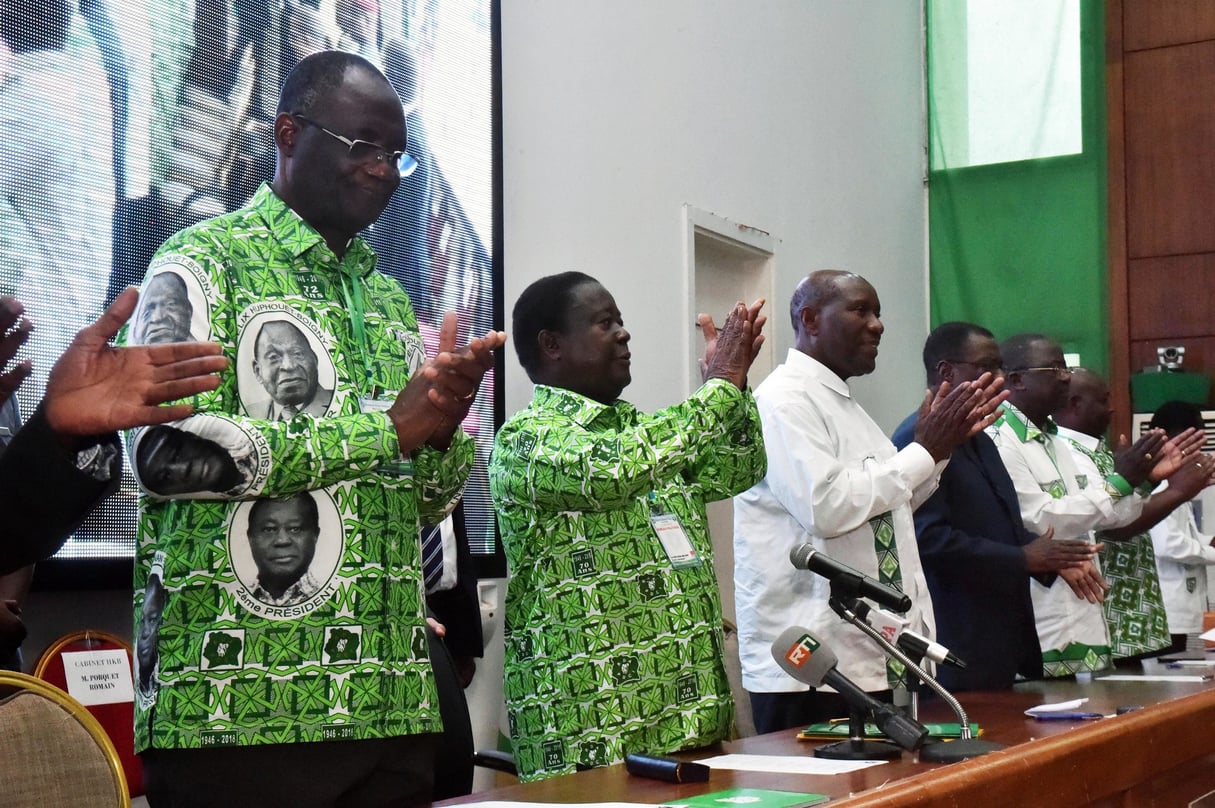 Le président du PDCI, Henri Konan Bédié, et son secrétaire exécutif Maurice Kakou Guikahué (à g.), le 17 juin 2018, à Abidjan. © Sia Kambou/AFP