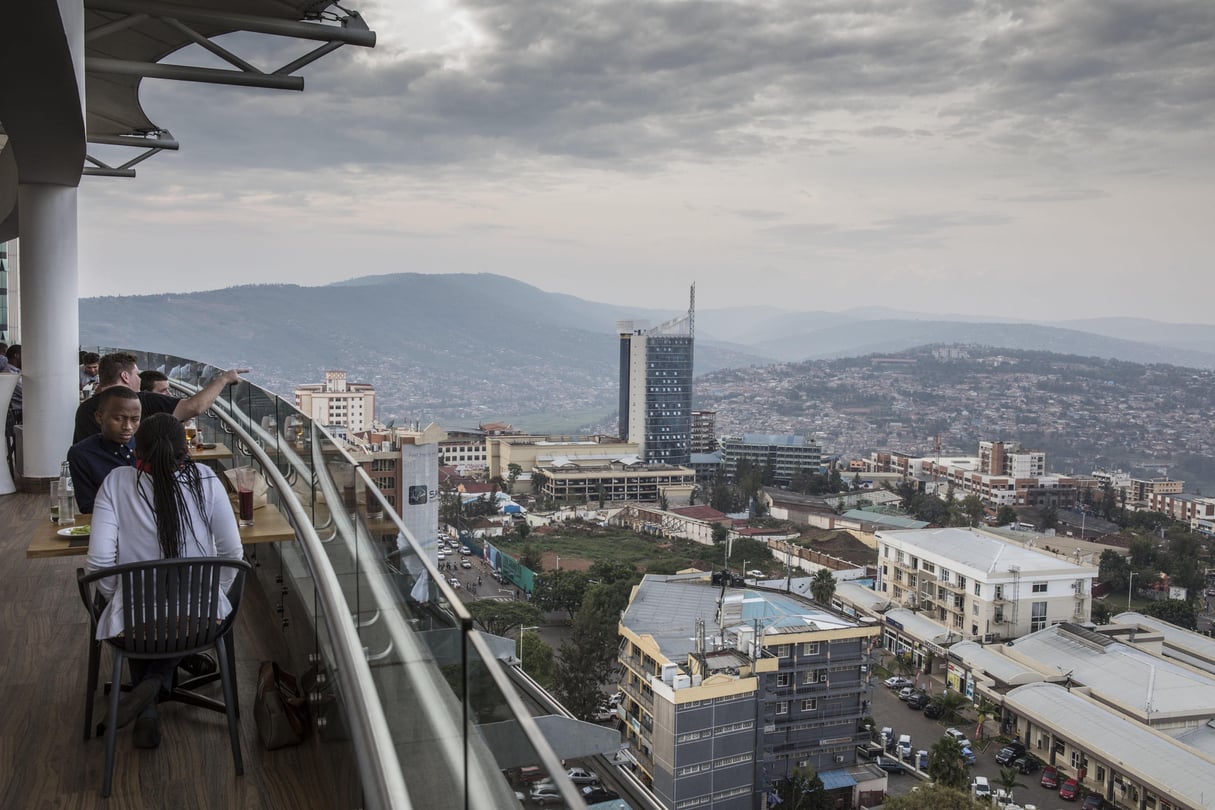 Downtown Kigali seen from the roof of the Ubumwe hotel. Outside of the Rwanda’s capital Kigali, delivery of emergency blood supplies to rural clinics and hospitals has been extremely challenging due to the rugged landscape and unpaved roads. Zipline has partnered with the Rwandan government  to provide delivery of blood and medical supplies by drone  Restauration, panorama Africa East Africa Rwanda UAV Ubumwe hotel Zipline blood delivery downtown drone highrise modern urban african blood supply rwandan medical health © Jason Florio/REDUX-REA