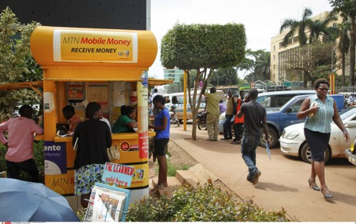 Kiosque de mobile-money à Kampala (Ouganda). © Stephen Wandera/AP/SIPA