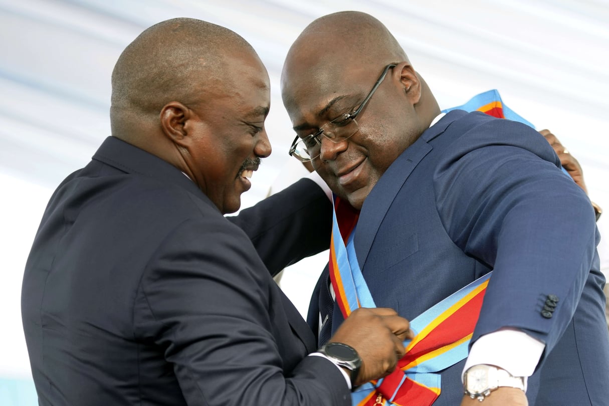 Joseph Kabila et Félix Tshisekedi, lors de l’investiture du second comme nouveau président de la RDC, le 24 janvier 2019. © Jerome Delay/AP/SIPA