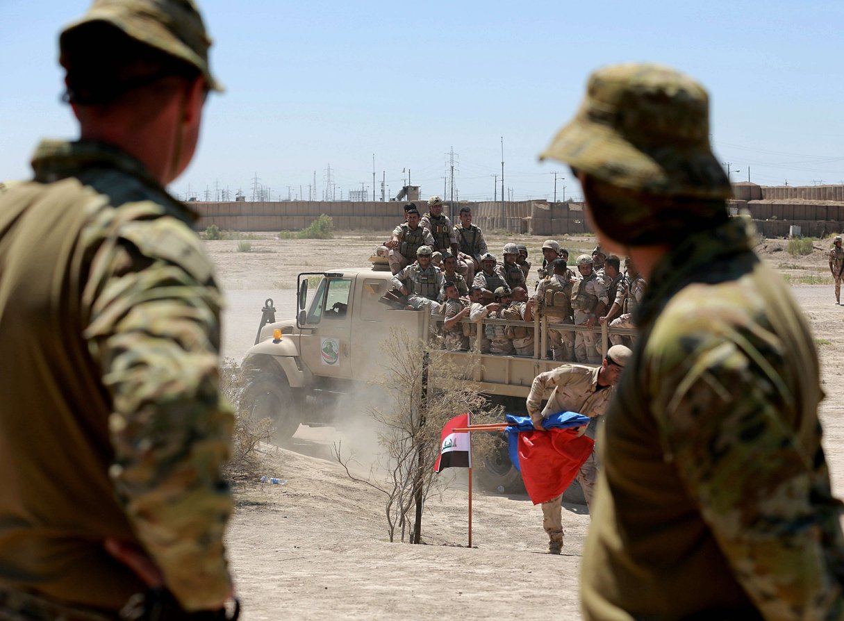 Des soldats de la coalition internationale lors d’un entraînement avec l’armée irakienne, en avril 2019 au nord de Bagdad (image d’illustration). © Hadi Mizban/AP/SIPA