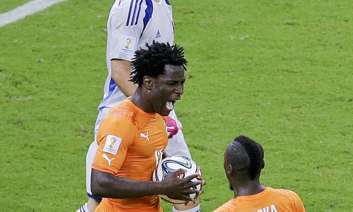L’Ivoirien Wilfried Bony célèbre son but contre le Japon lors du Mondial 2014 au Brésil. © Hassan Ammar/AP/SIPA