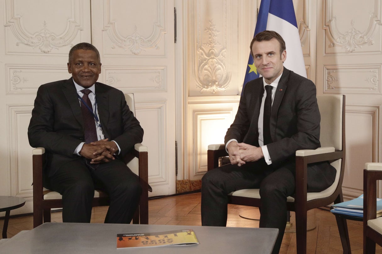 Aliko Dangote et Emmanuel Macron, à Versailles lors du forum "Choose France" &copy; Geoffroy Van Der Hasselt/AP/SIPA