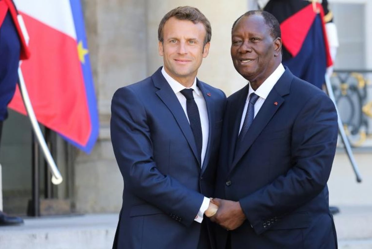 Alassane Ouattara et Emmanuel Macron, le 9 juillet 2019 à Paris. © Ludovic MARIN/AFP