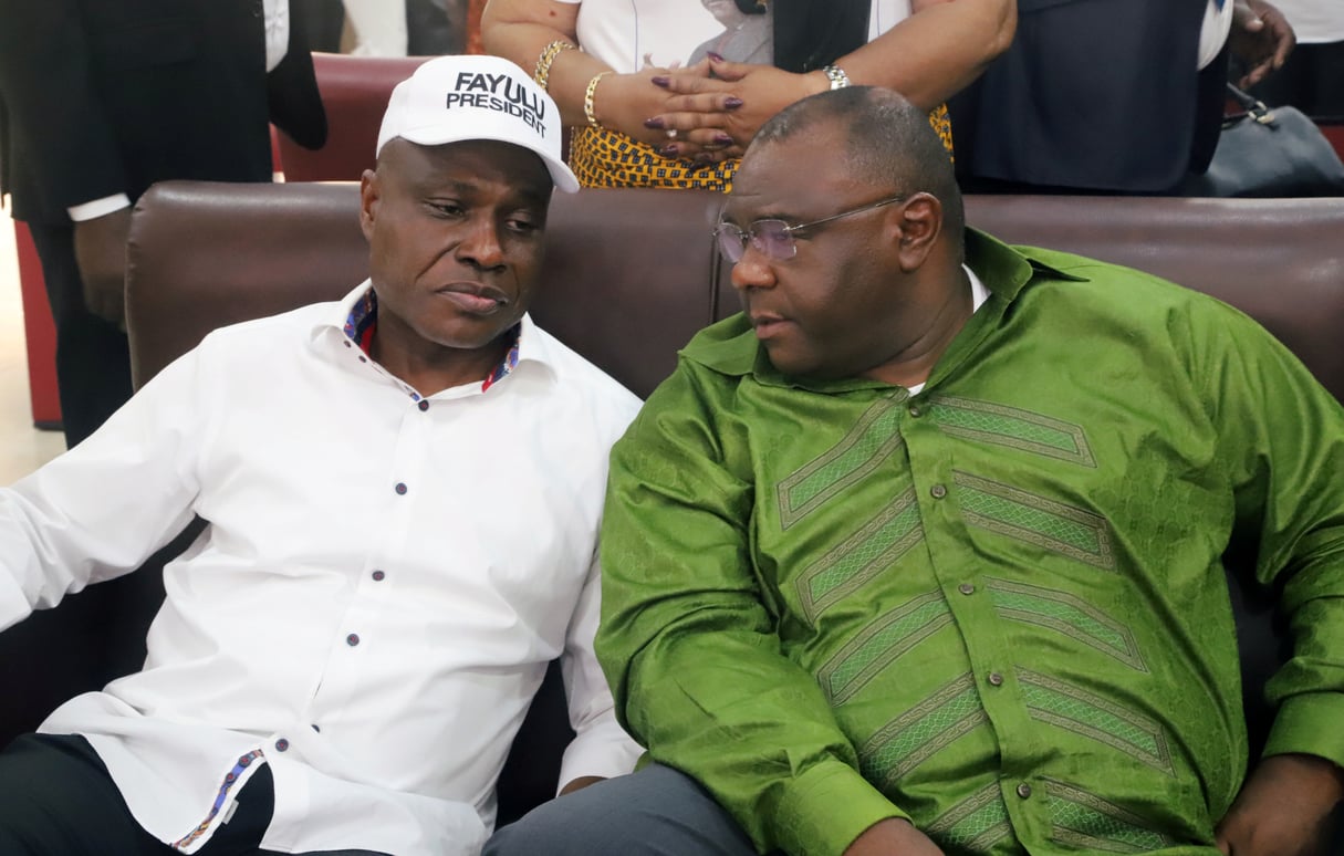 Martin Fayulu et Jean-Pierre Bemba, lors d’un meeting à Kinshasa le 23 juin 2019. © REUTERS/Kenny Katombe