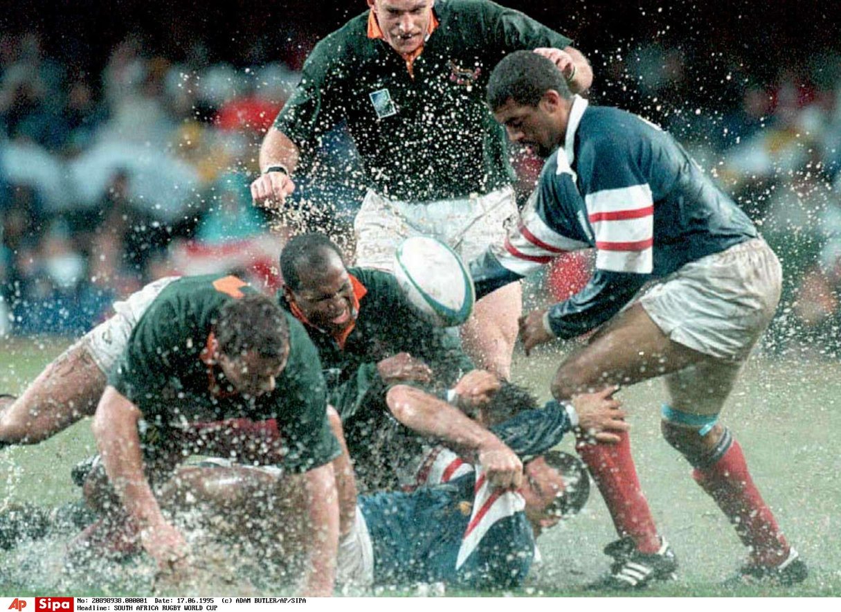 Chester Williams, au centre, lors de la coupe du monde de rugby, en 1995. &copy; ADAM BUTLER/AP/SIPA