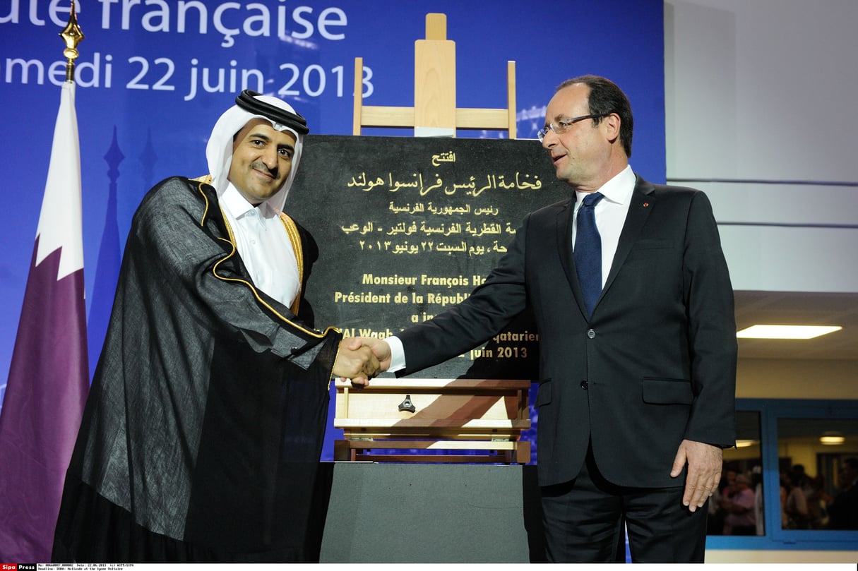 Ali Ben Fetais Al-Marri aux côtés de François Hollande., à Doha, le juin 2013. &copy; WITT/SIPA