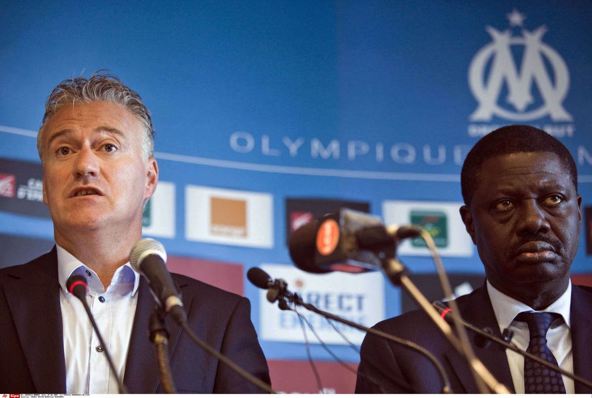 Didier Deschamps et Pape Diouf, en 2009. &copy; PATRICK GHERDOUSSI/AP/SIPA