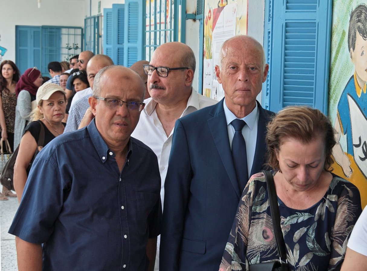 Naoufel et Kaïs Saïed à Tunis, le jour de l’élection présidentielle tunisienne, le 15 septembre 2019 © HASNA/AFP