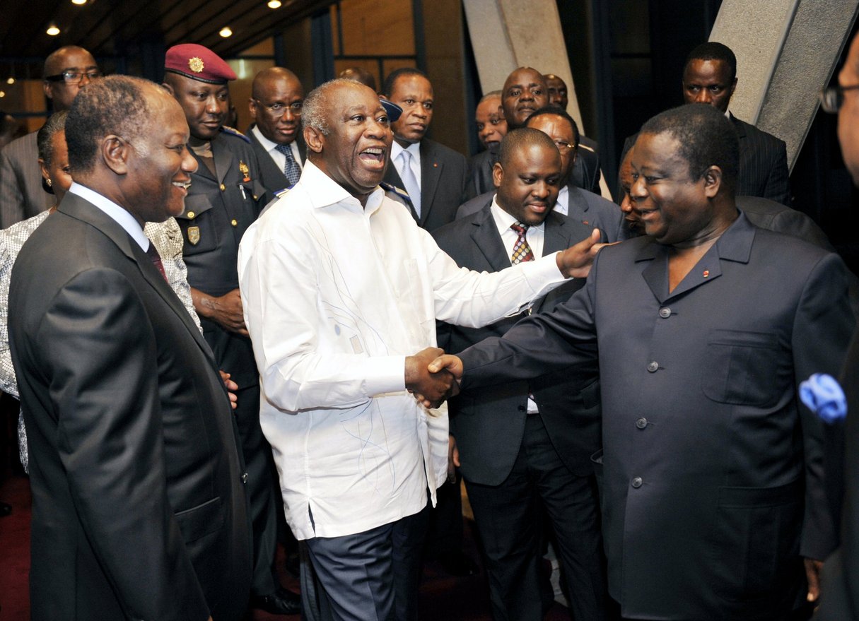 De g. à dr. : Alassane Ouattara, Laurent Gbagbo, Guillaume Soro et Henri Konan Bédié, le 30 juin 2010, à Abidjan. © KambouSia/AFP