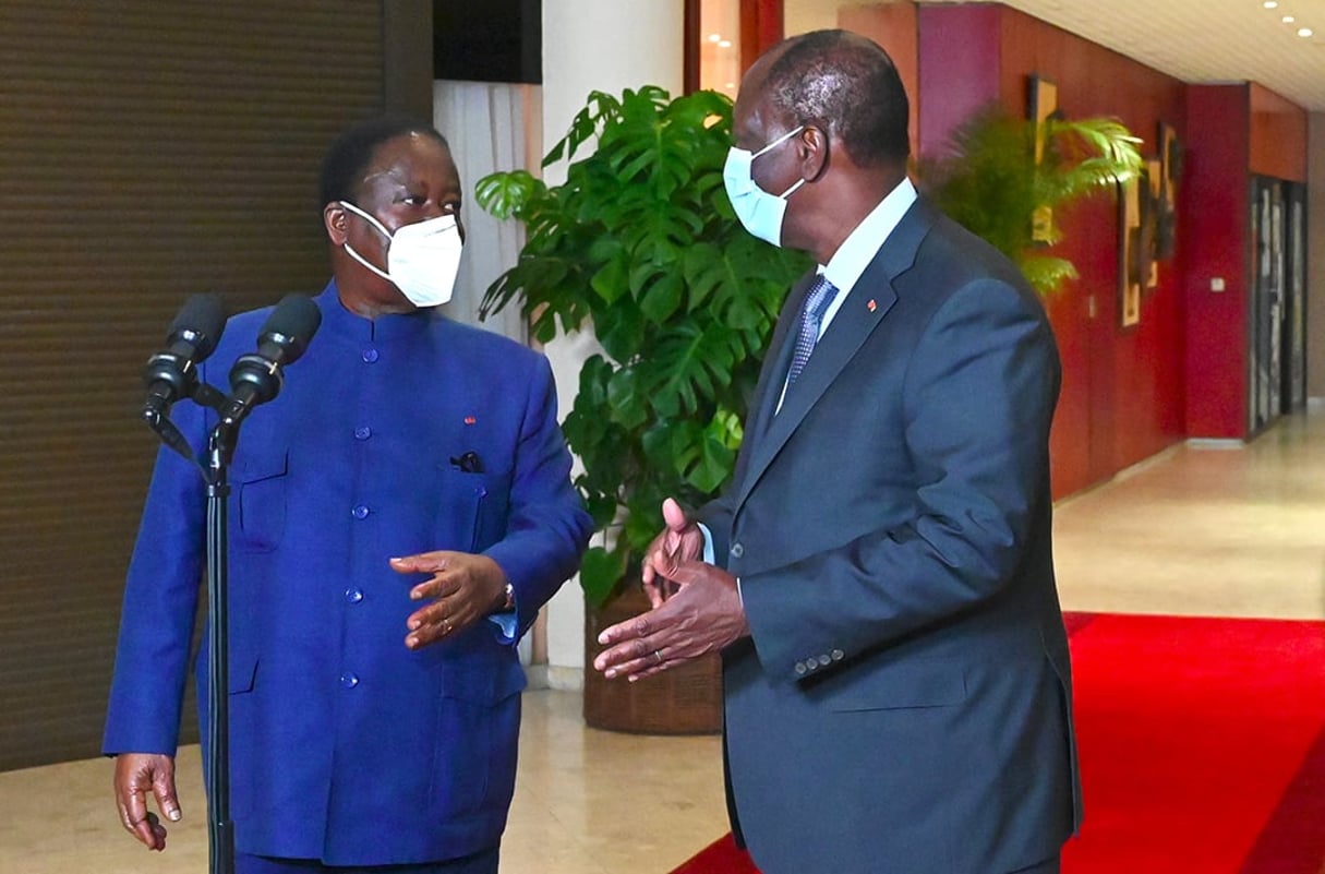 Henri Konan Bédié et Alassane Ouattara, le 11 novembre à Abidjan. © Issouf SANOGO / AFP