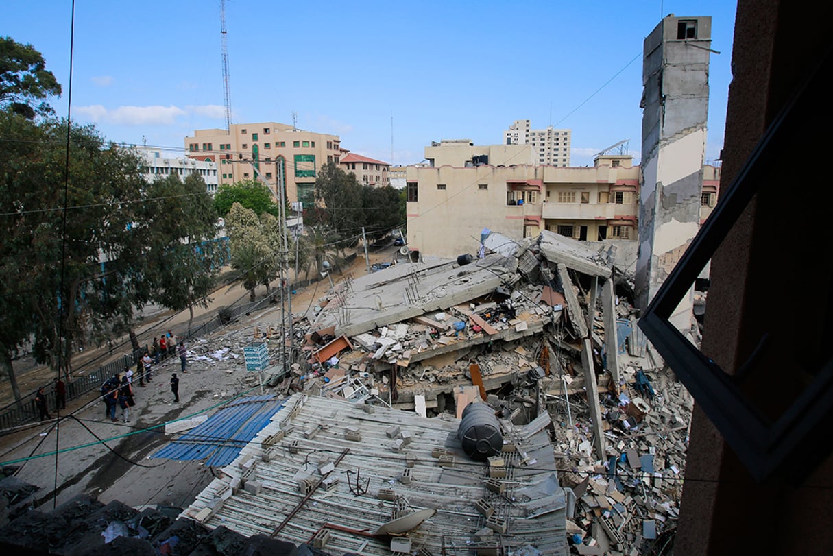 Restes d’un bâtiment bombardé par l’armée israélienne, à Gaza, le 18 mai 2021. © Ahmed Zakot/SPUTNIK/SIPA