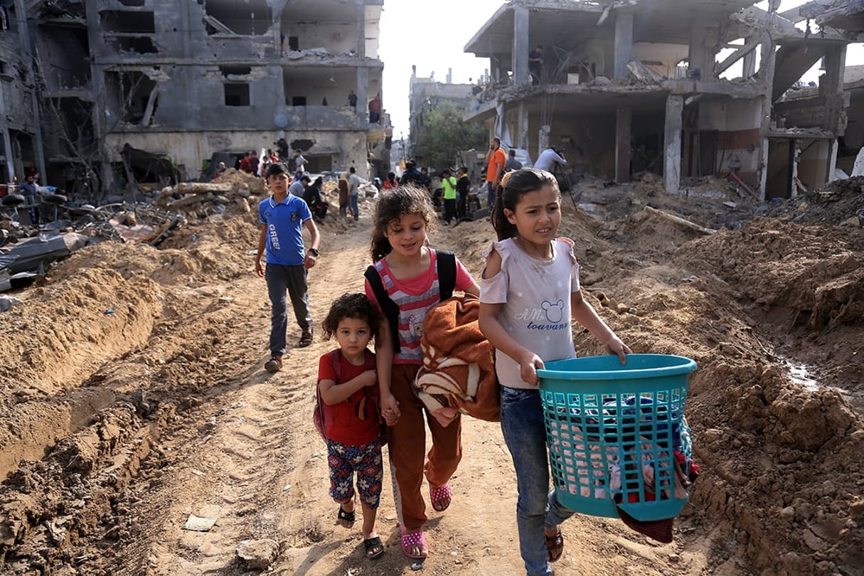 Dans un quartier de Beit Hanoun, dans le nord de la bande de Gaza, le 21 mai 2021, après l’entrée en vigueur d’un cessez-le-feu entre Israël et le Hamas. Children return to a neighborhood in Beit Hanoun, in the northern Gaza Strip, Friday, May 21, 2021, after a cease-fire between Israel and Hamas came into effect. As morning dawned with no reported violations of the truce, both sides were beginning to take stock of the deadliest Israeli-Palestinian fighting in seven years. (Samar Abu Elouf/The New York Times) *** Local Caption *** MIDDLE EAST DAMAGE DESTROYED CEASE FIRE AGREEMENT GAZA ISRAEL JEWISH PALESTINIAN PALESTINE CLASH HAMAS ROCKETS ATTACK ASIA VIOLENCE AIRSTRIKE MISSILE BOMB
© SAMAR ABU ELOUF/The New York Times-REDUX-REA