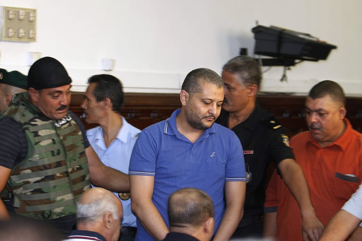 Imed Trabelsi (au centre), au tribunal de Tunis le 10 août 2011. © REUTERS/Zoubeir Souissi © REUTERS/Zoubeir Souissi