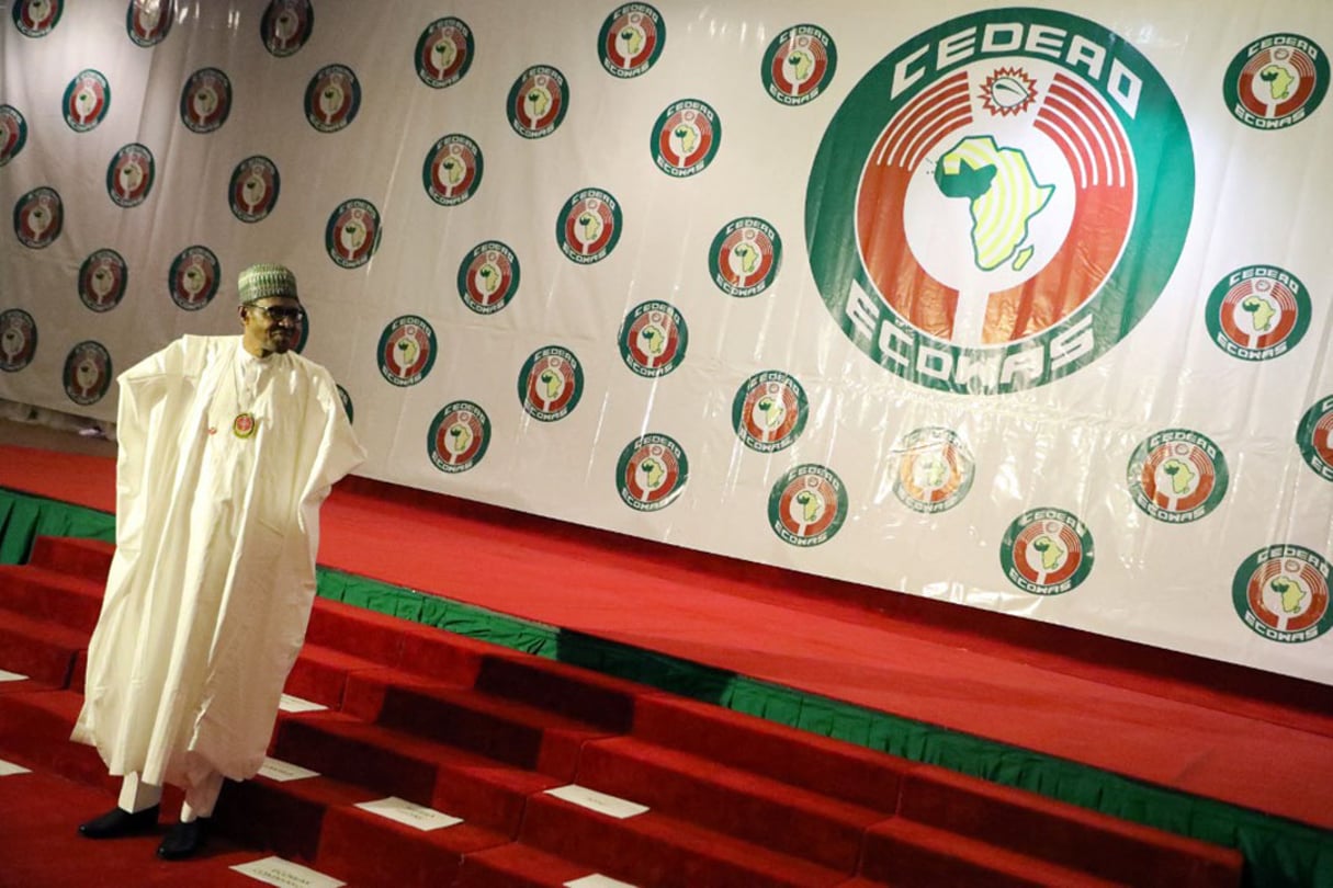 Le président du Nigeria Muhammadu Buhari assiste au 56e sommet ordinaire de la Communauté économique des États de l’Afrique de l’Ouest à Abuja, le 21 décembre 2019. © Kola SULAIMON/AFP