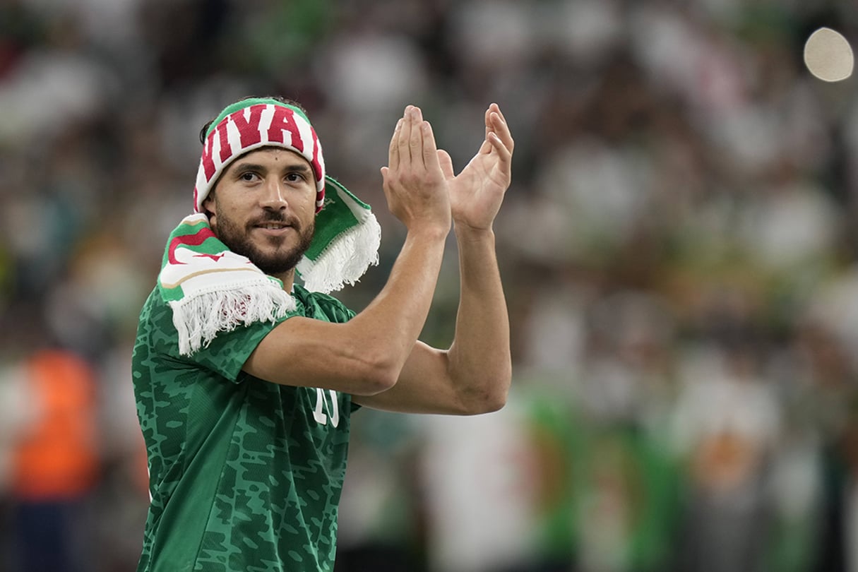 Youcef Belaïli savoure la victoire de l’Algérie face à la Tunisie (2-0) lors de la finale de la Coupe arabe, au Qatar, le samedi 18 décembre 2021. © Darko Bandic/AP/SIPA
