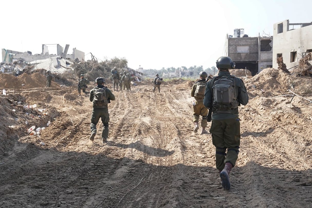 Cette photo diffusée par l’armée israélienne le 26 janvier 2024 montre des soldats israéliens opérant dans la bande de Gaza. © Israeli Army / AFP