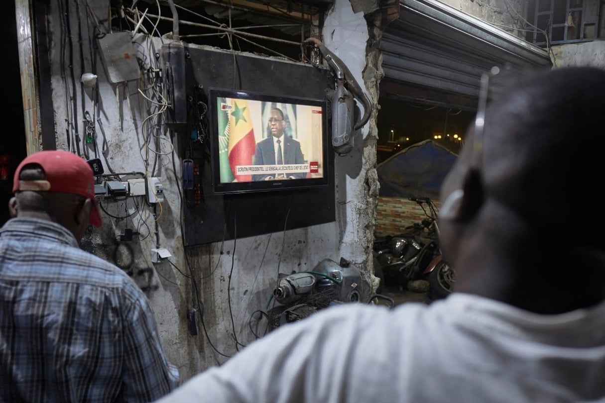 La conférence de presse du président sénégalais Macky Sall à la télévision nationale, dans le quartier de Médina à Dakar, le 22 février 2024. © Michele Cattani / AFP