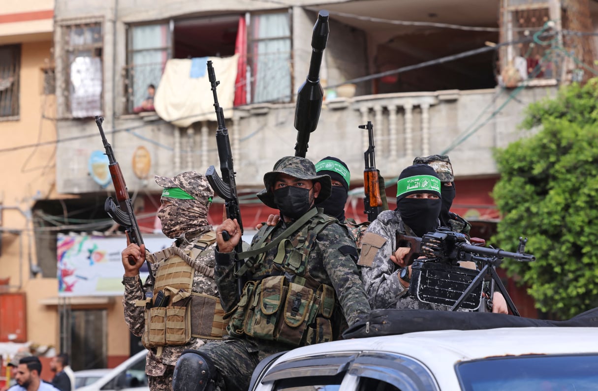 Des membres des brigades Al-Qassam, la branche armée du groupe palestinien du Hamas, à Gaza, le 22 mai 2021. © Emmanuel DUNAND/AFP