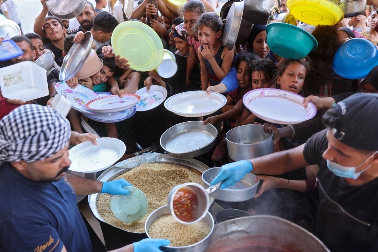 Point de distribution de nourriture à Beit Lahia, dans le nord de la bande de Gaza, le 18 juillet 2024. © Omar AL-QATTAA / AFP