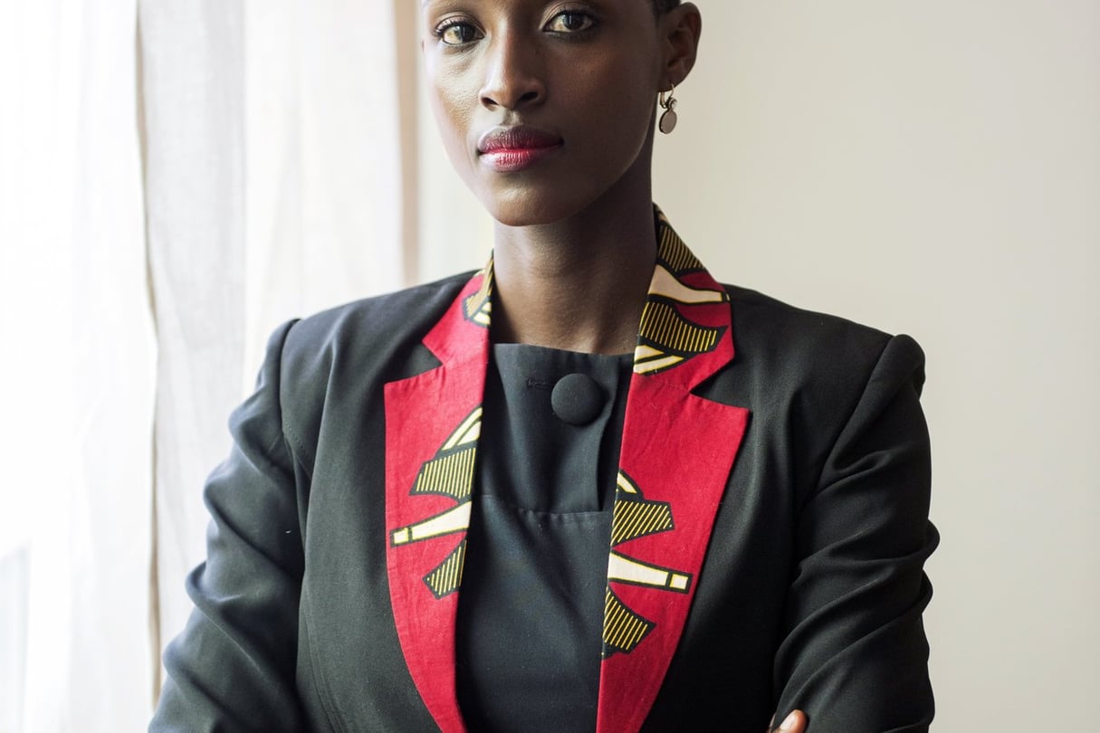 Aujourd’hui directrice adjointe du cabinet de Paul Kagame, la jeune femme a appris à vivre avec le passé de sa mère. © Philippe Nyirimihigo/Illume pour JA