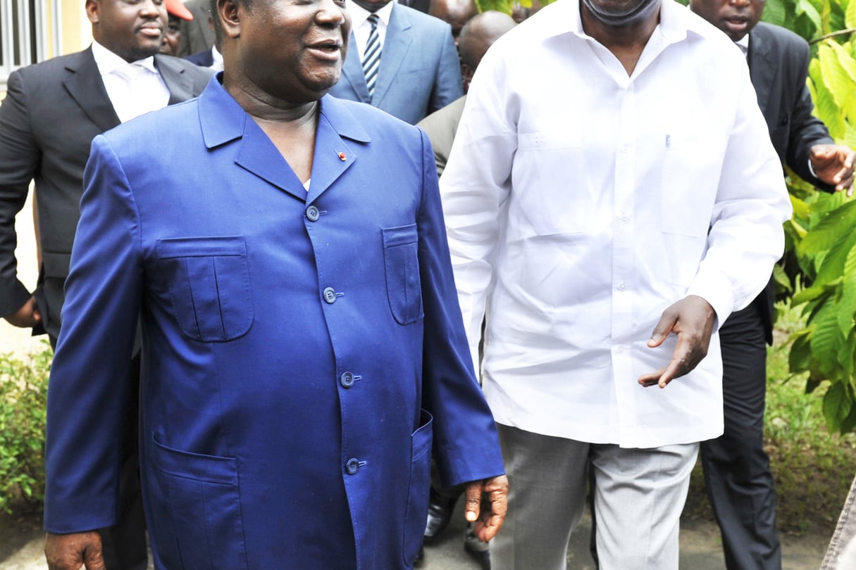 Henri Konan Bédié (à g.) et Laurent Gbagbo, le 10 mai 2010 à Abidjan. © SIA KAMBOU/AFP