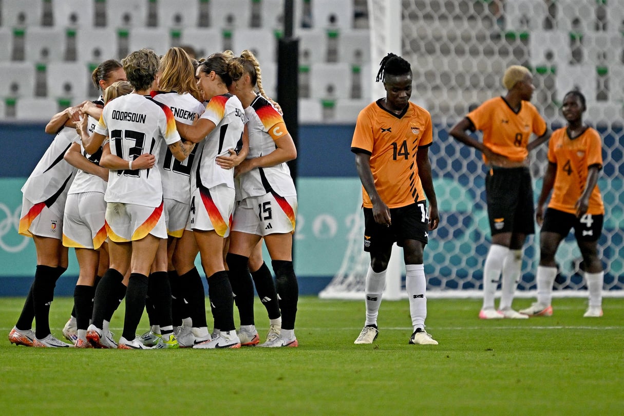  L’équipe d’Allemagne célèbre après son quatrième but face à la Zambie
© Arnaud FINISTRE / AFP