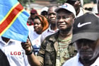 Feu Chérubin Okende, ancien ministre des Transports et membre d’Ensemble pour la République, lors d’une manifestation de l’opposition à Kinshasa, le 11 mars 2023. © Samy Ntumba Shambuyi/AP/SIPA