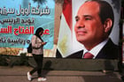 Panneau de campagne du président égyptien Abdel Fattah al-Sissi un jour avant l’élection présidentielle de 2018, au Caire. © Salah Malkawi/Getty Images via AFP