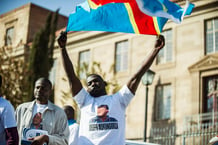 Un partisan du pasteur Joseph Mukungubila, le 15 juillet 2014. © MUJAHID SAFODIEN/AFP