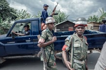 Des policiers et des soldats des FARDC près de Goma, en 2019 (illustration). © Photo by Luke Dennison / AFP