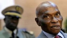 Abdoulaye Wade est soupçonné par l’opposition de vouloir que son fils Karim lui succède. © AFP