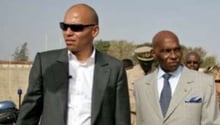 Les Wade père et fils, à Dakar pendant le 11e sommet de l’OCI, en mai 2008. © AFP