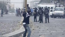 Heurts entre police et manifestants, le 1er février 2012 à Dakar. © AFP