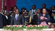 Kabila doit changer pour rompre son isolement, visible lors de son investiture, en décembre 2011. © Gwenn Dubourthoumieu/AFP