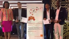 De g. à dr. : Elizabeth Medou Bedang (Orange Cameroun), Alexandre Castel (Station Energy Ivoire, 2e prix), Thuto Paul Gaotingwe (Modisar, 1er prix) et Moussa Traoré (Bouquet Pass Santé, 3e prix). © Orange