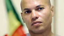 Karim Wade a entraîne dans sa chute neuf complices présumés. © GEORGES GOBET / AFP