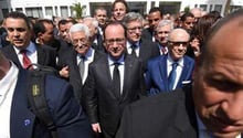 Béji Caïd Essebsi au côté de Francois Hollande et du président palestinien Mahmoud Abbas. © Emmanuel Dunand-AFP