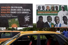 Les affiches électorales à Dakar le 29 juillet 2017. © Seyllou/AFP