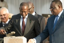 Mahammed Dionne, le Premier ministre sénégalais, aux côtés de Macky Sall en septembre 2014 à Dakar. © Youri Lenquette pour JA