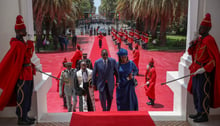 Sur les marches du palais de la République, avec son épouse, Marième Faye Sall, le 2 avril. © Lionel Mandeix/Présidence Sénégal