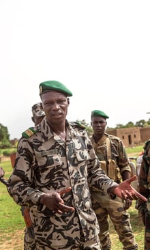 Col. Didier Dacko, who commands the Malian army forces of Mopti, with soldiers in Konna, Mali, Aug. 1, 2012. Haphazard citizen militias opposing radical Islamist forces have few resources but, unlike the regular Malian army, have a fierce will to undo the conquest of northern Mali. (Marco Gualazzini/The New York Times) © MARCO GUALAZZINI/NYT-REDUX-REA