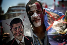 Manifestation contre le président Mohamed Morsi, sur la place Tahrir, au Caire, le 30 juin 2013. © Gianluigi Guercia/AFP